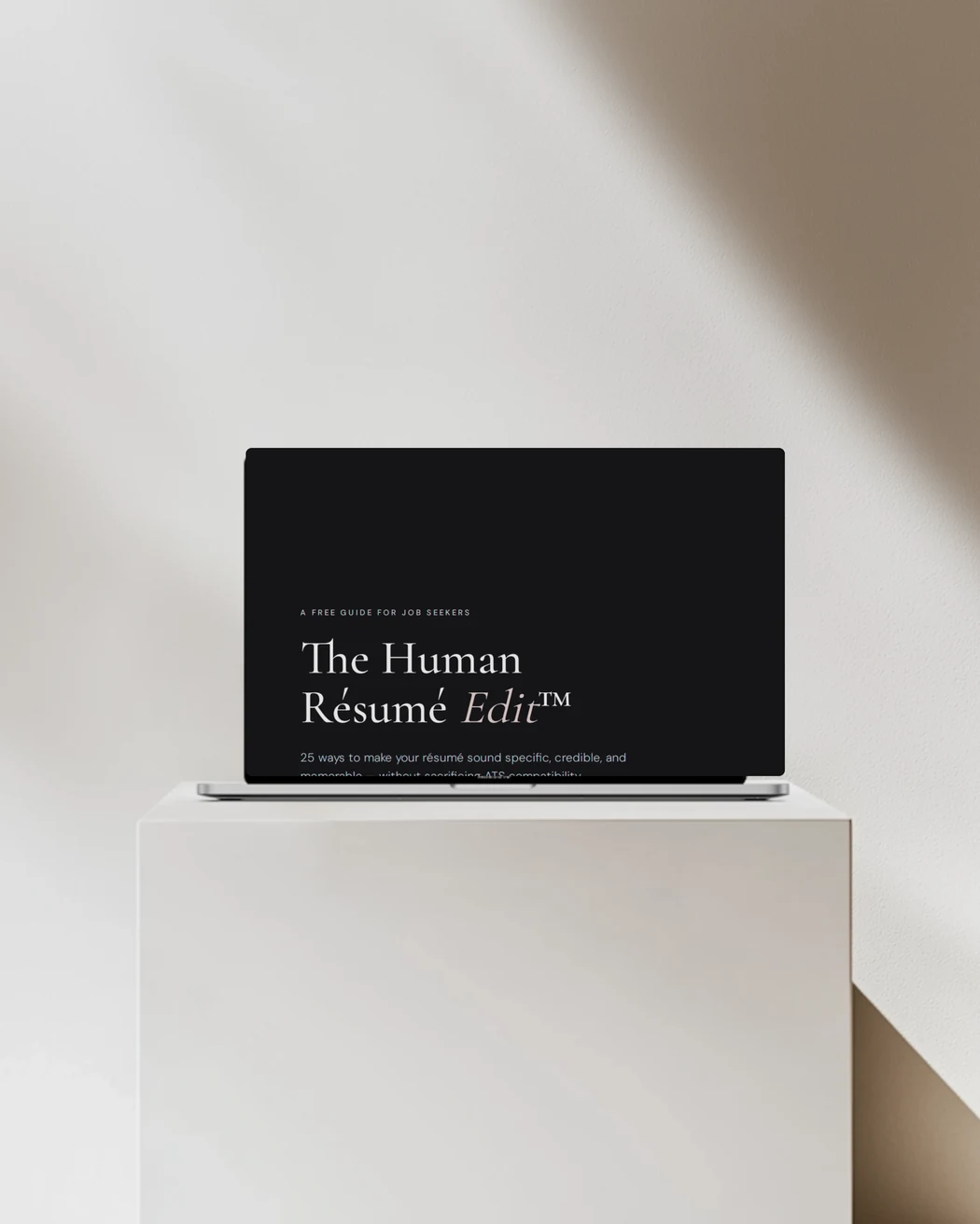 The Human Résumé Edit guide displayed on a laptop